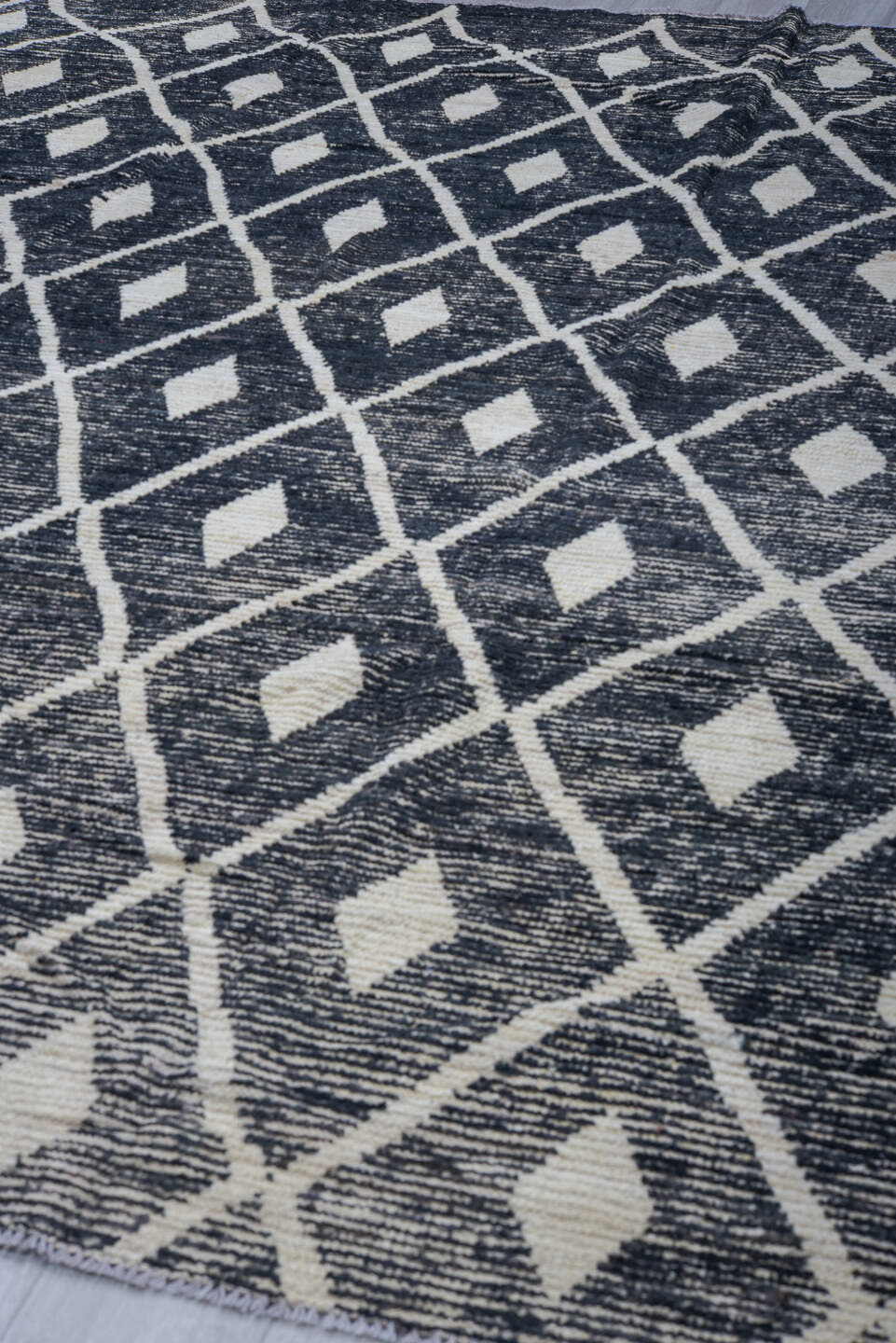 9' x 11' one-of-a-kind handmade vintage Tulu large size rug. Color palette: charcoal, ivory, gray, black