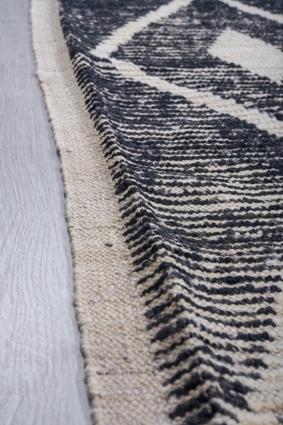 9' x 11' one-of-a-kind handmade vintage Tulu large size rug. Color palette: charcoal, ivory, gray, black