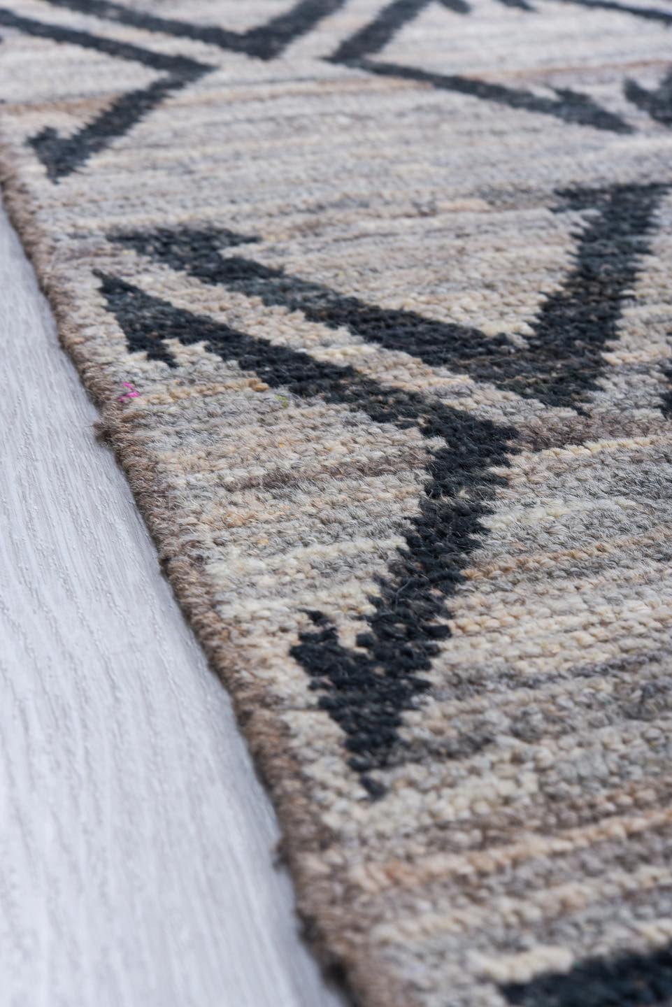 9' x 11' one-of-a-kind handmade vintage Tulu large size rug. Color palette: ivory, charcoal, gray, taupe, black, beige