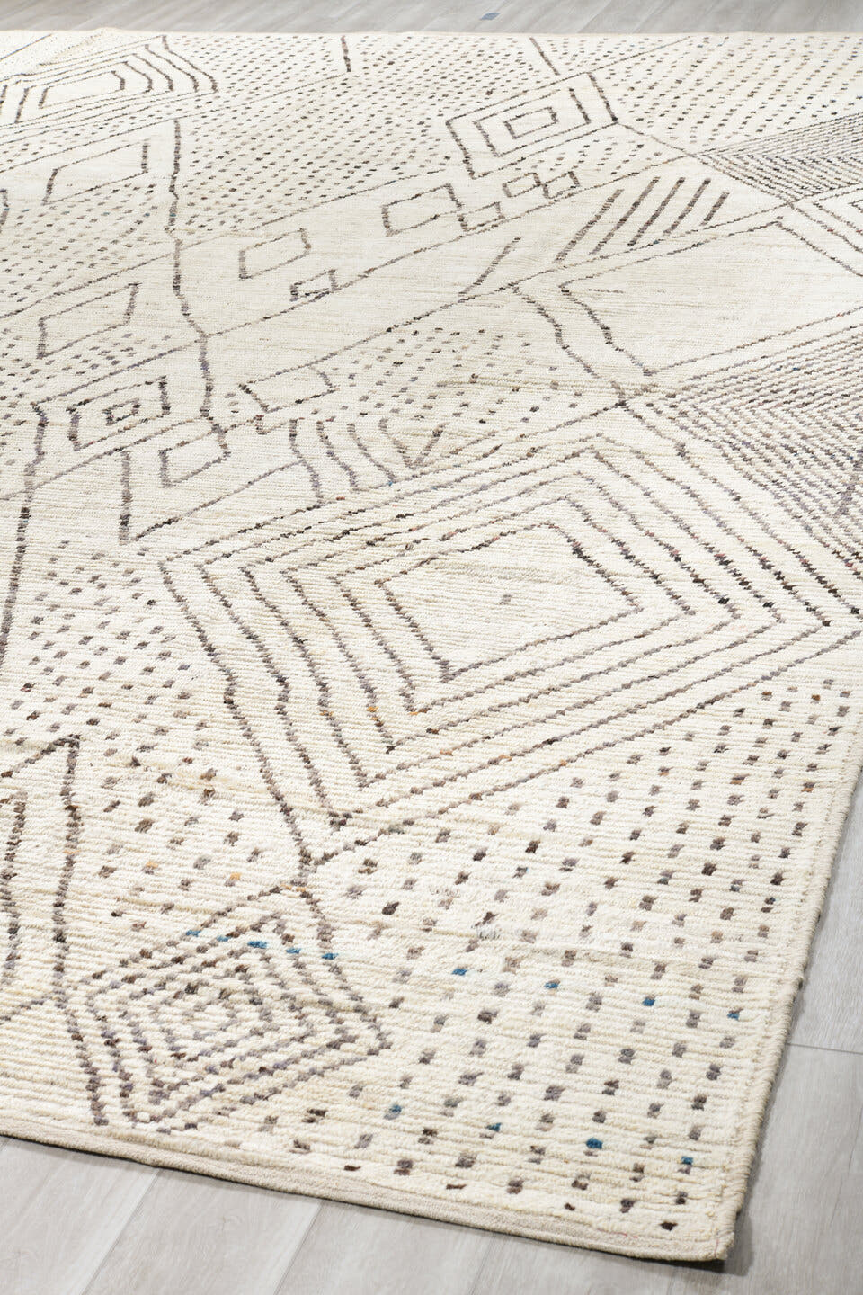 11' x 17' one-of-a-kind handmade vintage Tulu oversize rug. Color palette: ivory, charcoal, taupe, cream, gray, black, beige