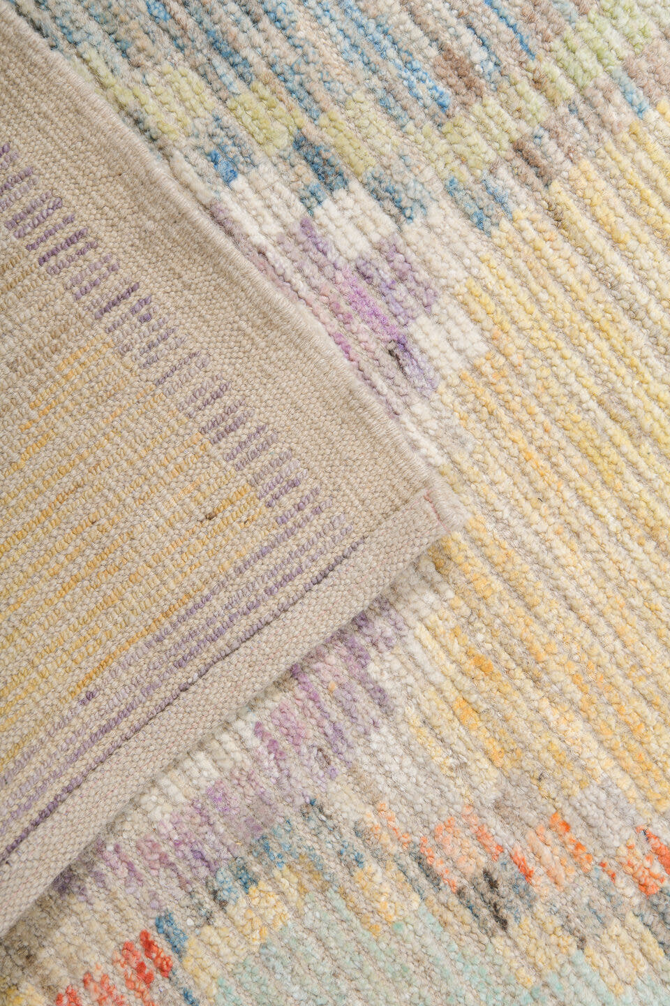 13' x 16' one-of-a-kind handmade vintage Tulu oversize rug. Color palette: ivory, aqua, apricot, lavender, taupe, coral