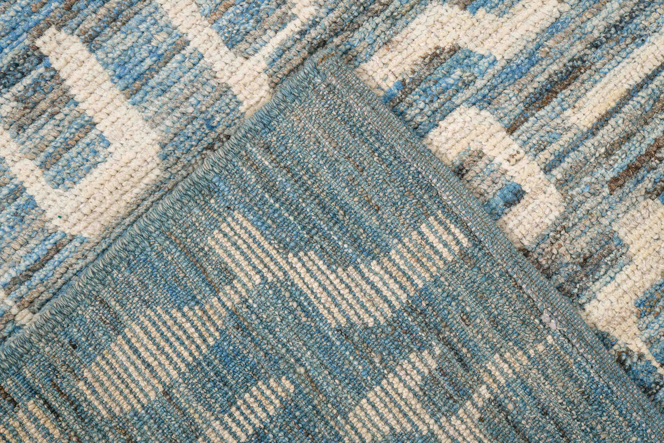 6' x 9' one-of-a-kind handmade vintage Tulu medium size rug. Color palette: sky blue, ivory, slate, cream, light blue, gray