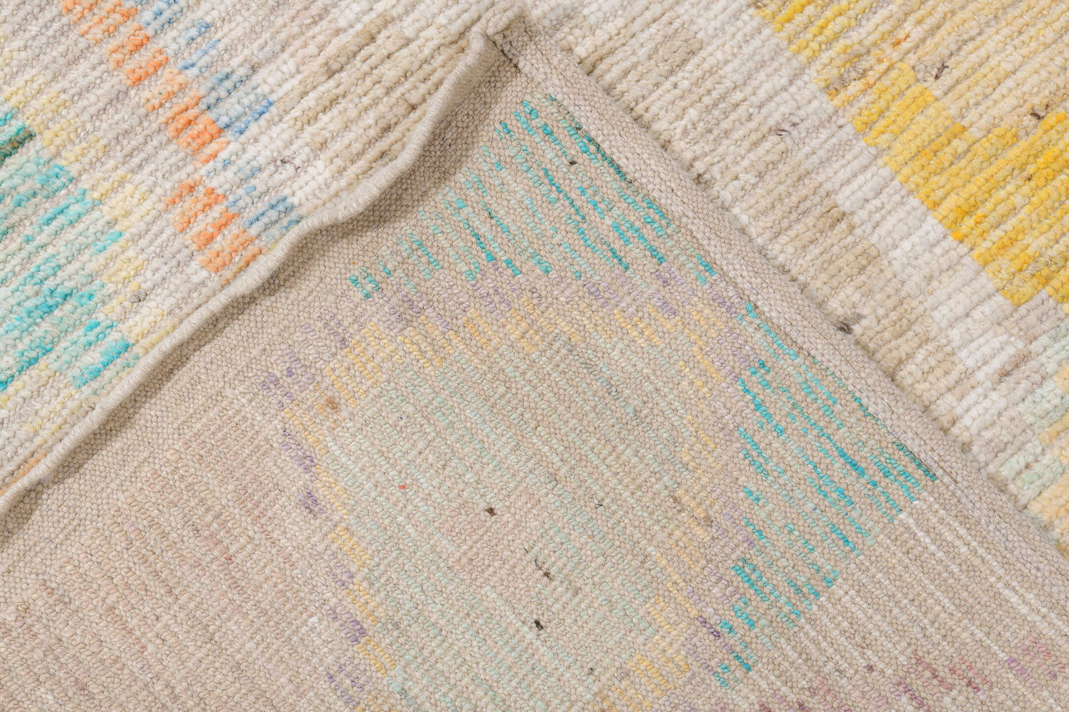 10' x 13' one-of-a-kind handmade vintage Tulu large size rug. Color palette: ivory, aqua, apricot, lavender, pale yellow
