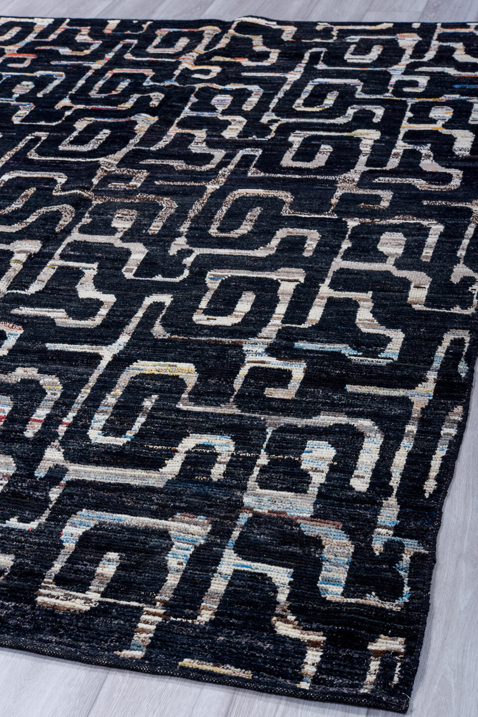 6' x 8' one-of-a-kind handmade vintage Tulu medium size rug. Color palette: charcoal, ivory, slate, taupe, rust, navy, gray