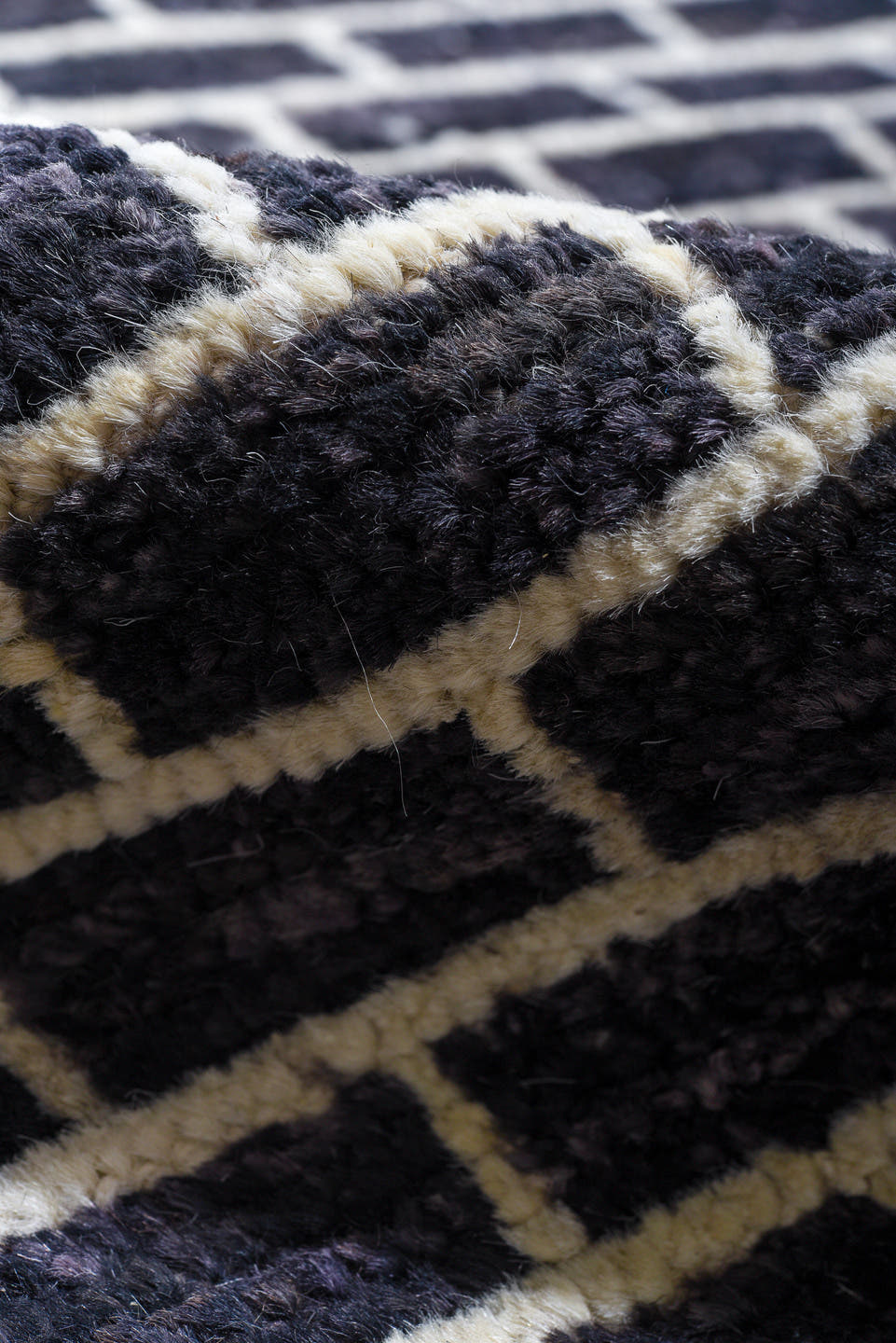 9' x 14' one-of-a-kind handmade vintage Tulu large size rug. Color palette: charcoal, ivory, gray, black