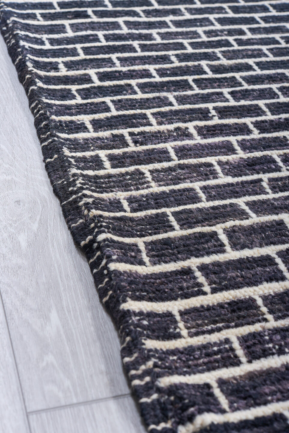 9' x 14' one-of-a-kind handmade vintage Tulu large size rug. Color palette: charcoal, ivory, gray, black