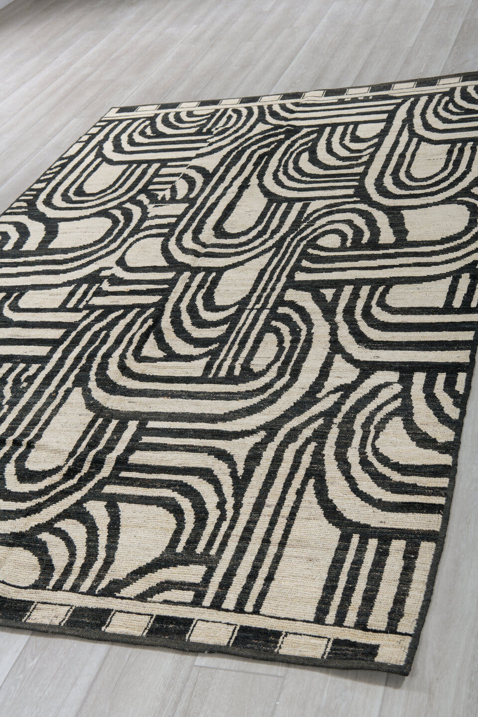 6' x 9' one-of-a-kind handmade vintage Tulu medium size rug. Color palette: ivory, charcoal, gray, black