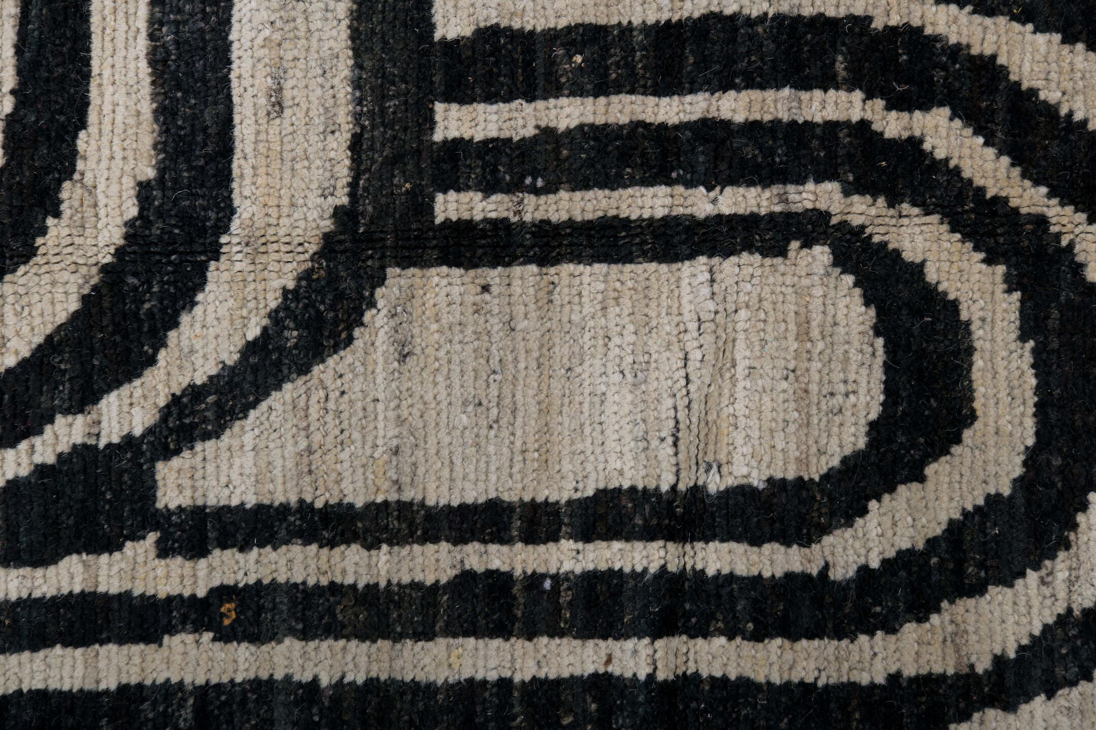6' x 9' one-of-a-kind handmade vintage Tulu medium size rug. Color palette: ivory, charcoal, gray, black