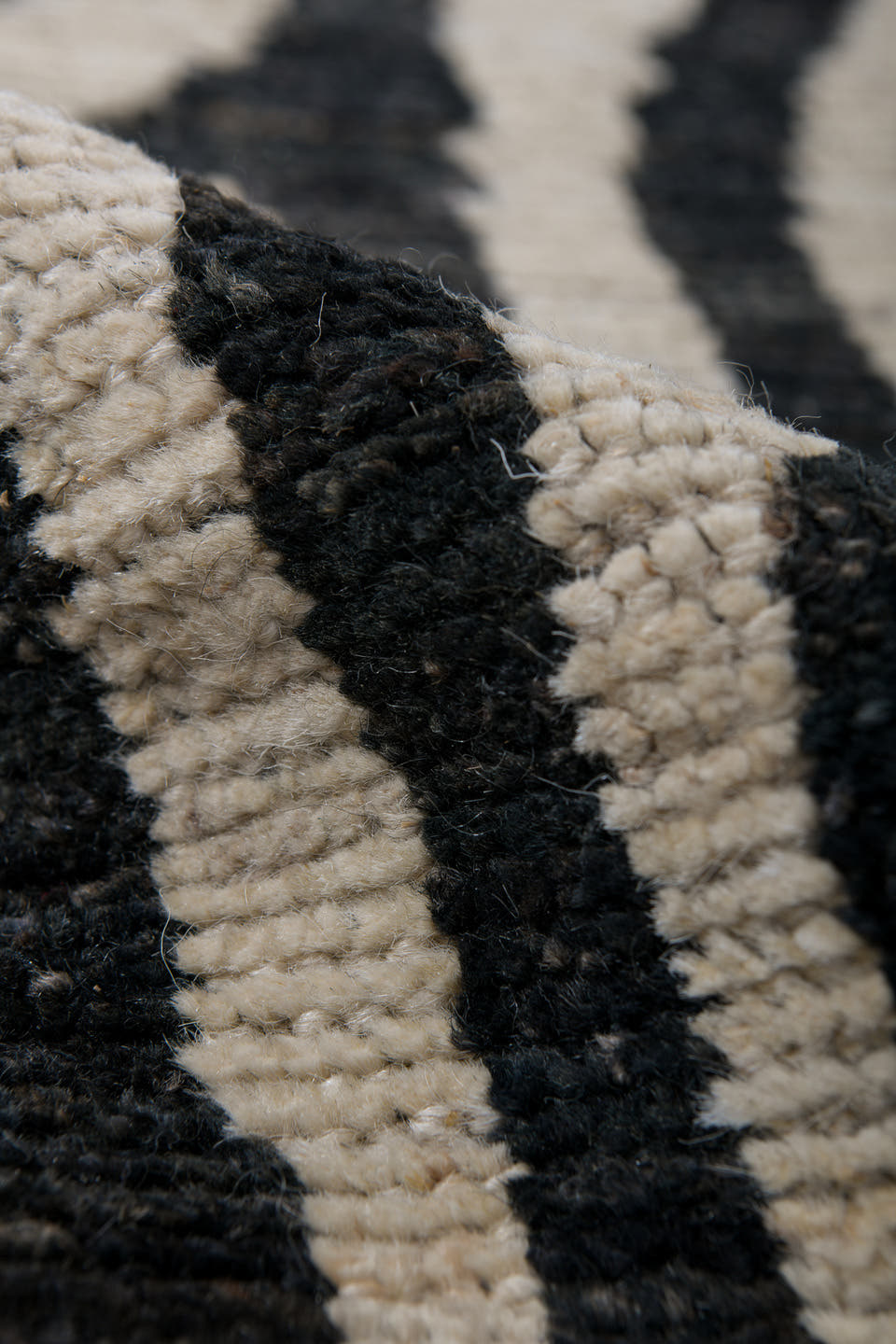 6' x 9' one-of-a-kind handmade vintage Tulu medium size rug. Color palette: ivory, charcoal, gray, black