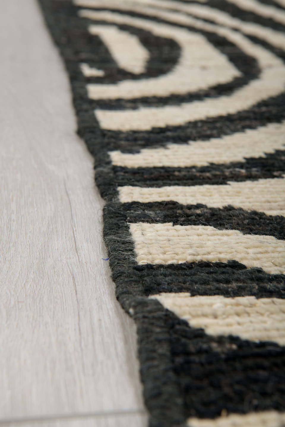 6' x 9' one-of-a-kind handmade vintage Tulu medium size rug. Color palette: ivory, charcoal, gray, black