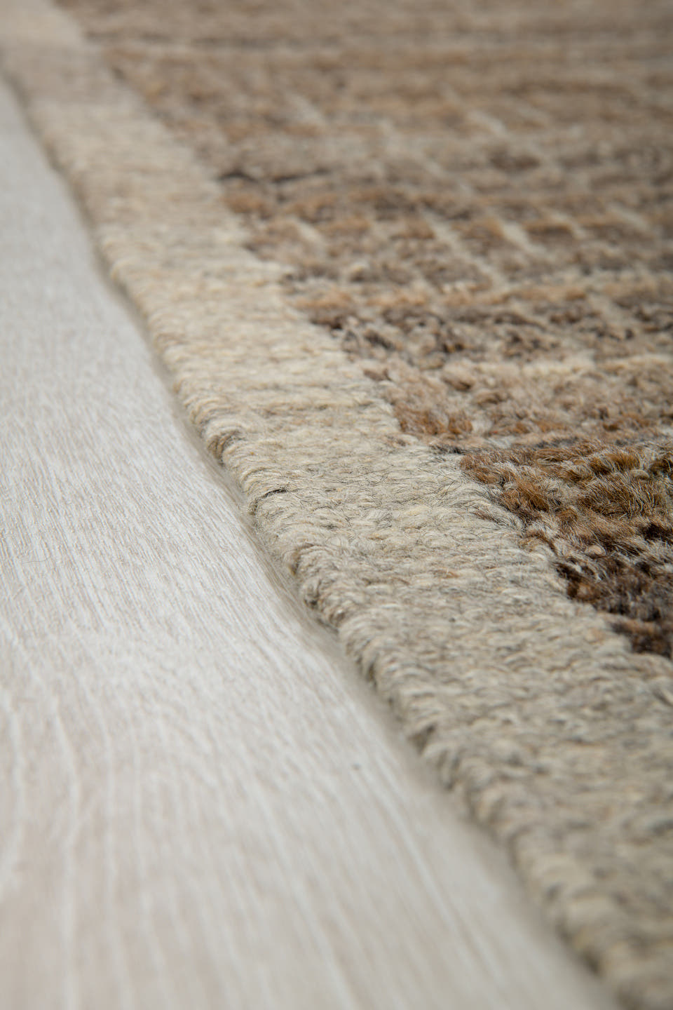 8' x 9' one-of-a-kind handmade vintage Tulu rug. Color palette: taupe, brown, ivory, gray, camel, charcoal, beige, black