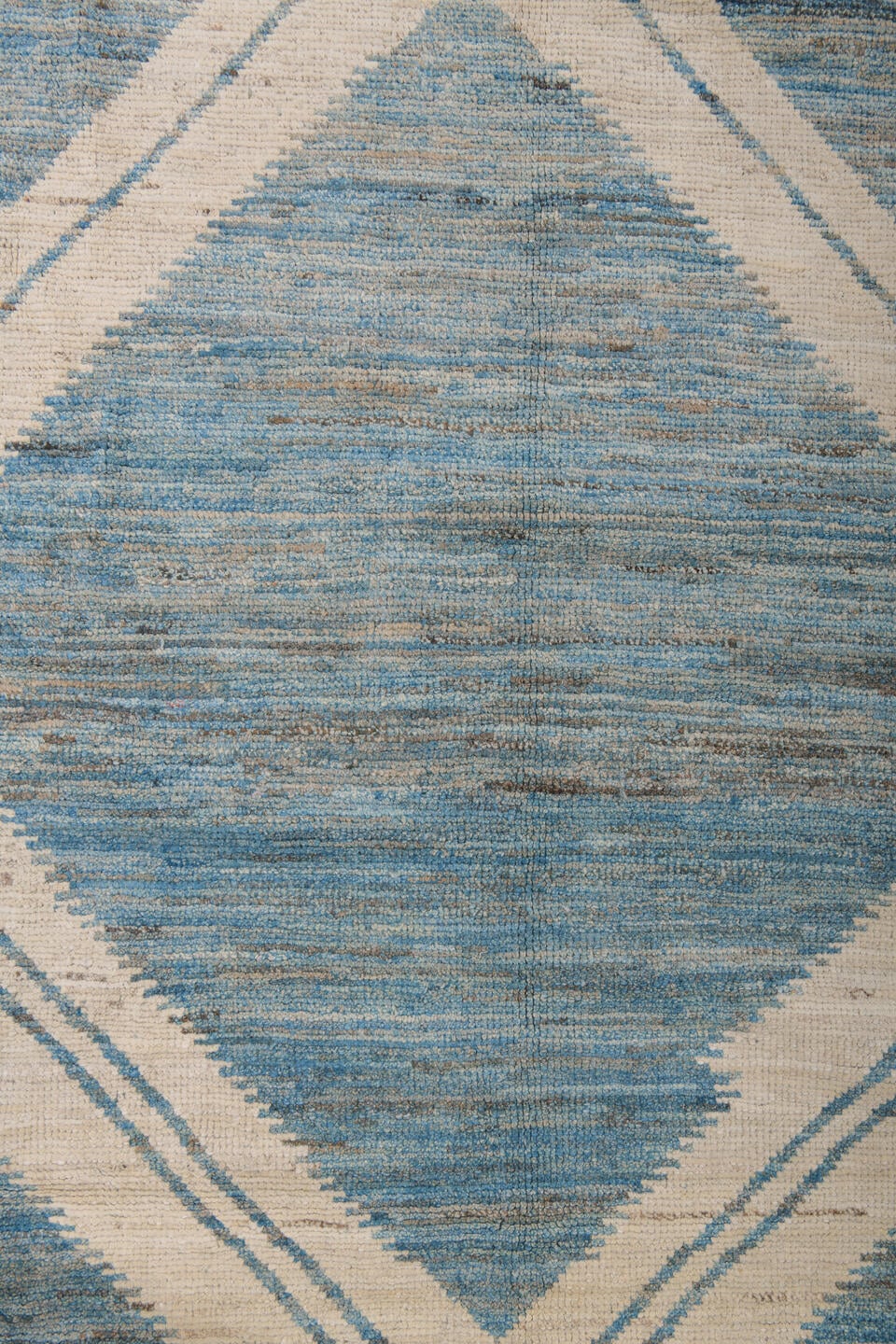 9' x 12' one-of-a-kind handmade vintage Tulu large size rug. Color palette: sky blue, ivory, slate, cream, light blue, gray