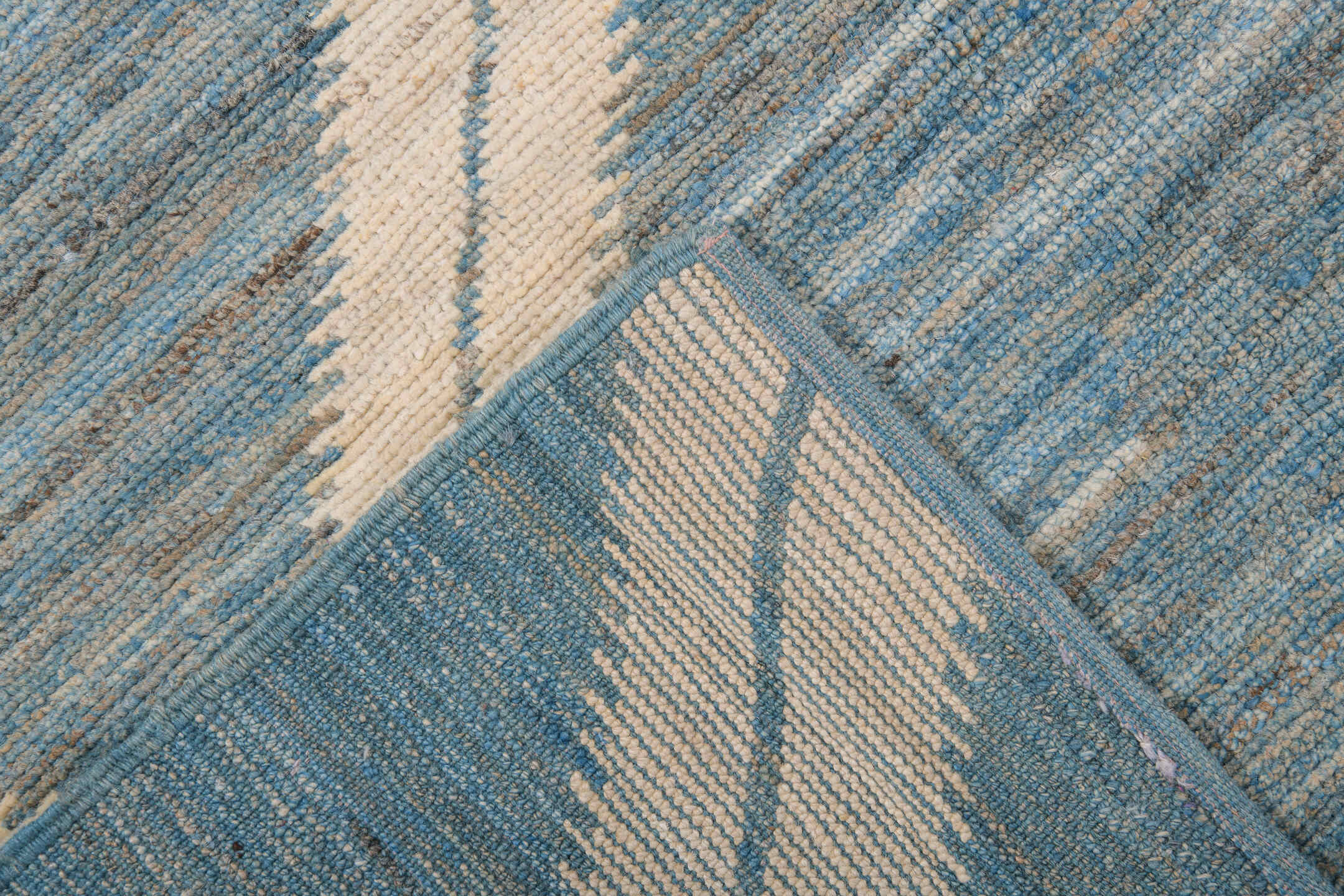 9' x 12' one-of-a-kind handmade vintage Tulu large size rug. Color palette: sky blue, ivory, slate, cream, light blue, gray