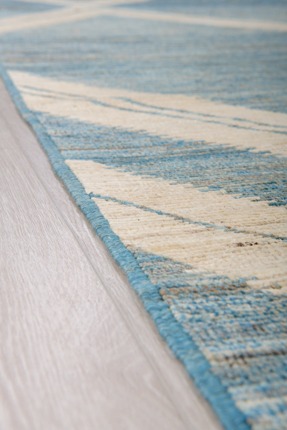 9' x 12' one-of-a-kind handmade vintage Tulu large size rug. Color palette: sky blue, ivory, slate, cream, light blue, gray