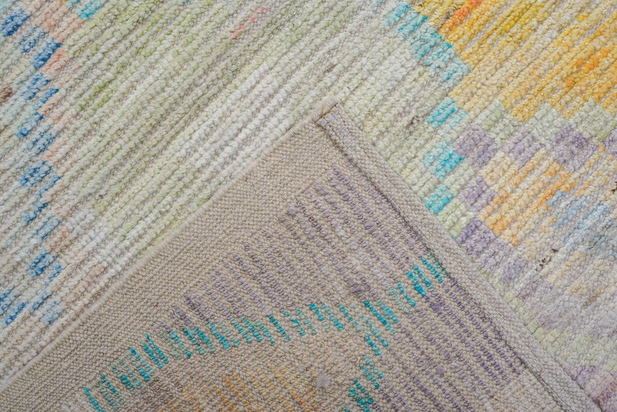 9' x 12' one-of-a-kind handmade vintage Tulu large size rug. Color palette: ivory, aqua, sky blue, peach, pale yellow
