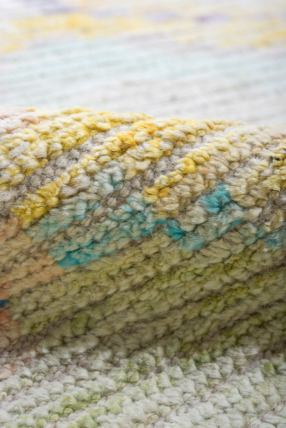 9' x 12' one-of-a-kind handmade vintage Tulu large size rug. Color palette: ivory, aqua, sky blue, peach, pale yellow