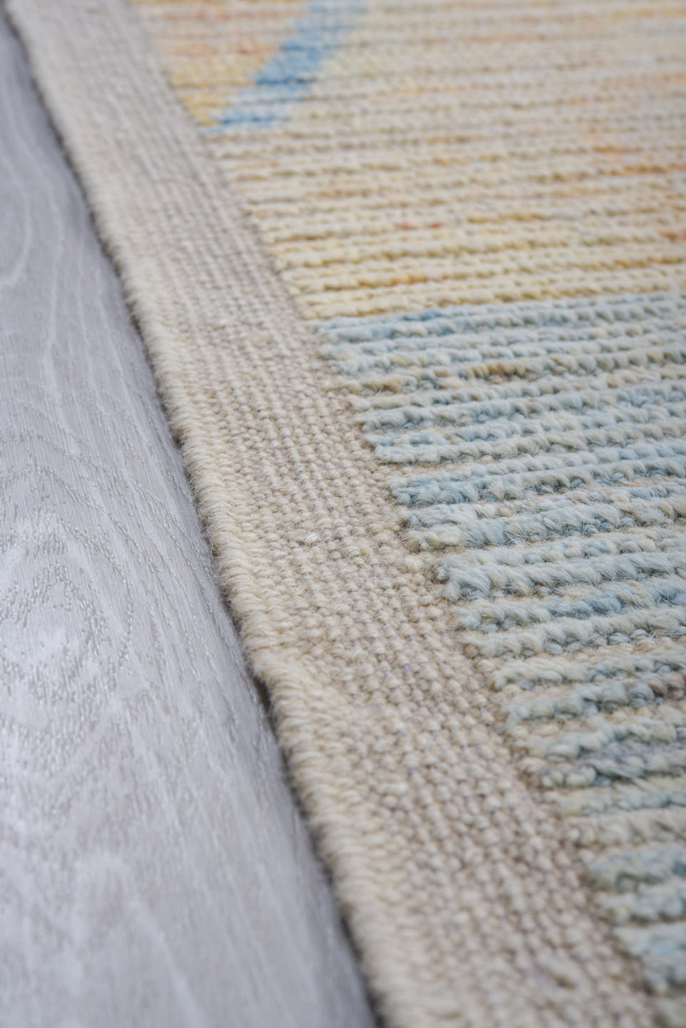 9' x 12' one-of-a-kind handmade vintage Tulu large size rug. Color palette: ivory, aqua, sky blue, peach, pale yellow
