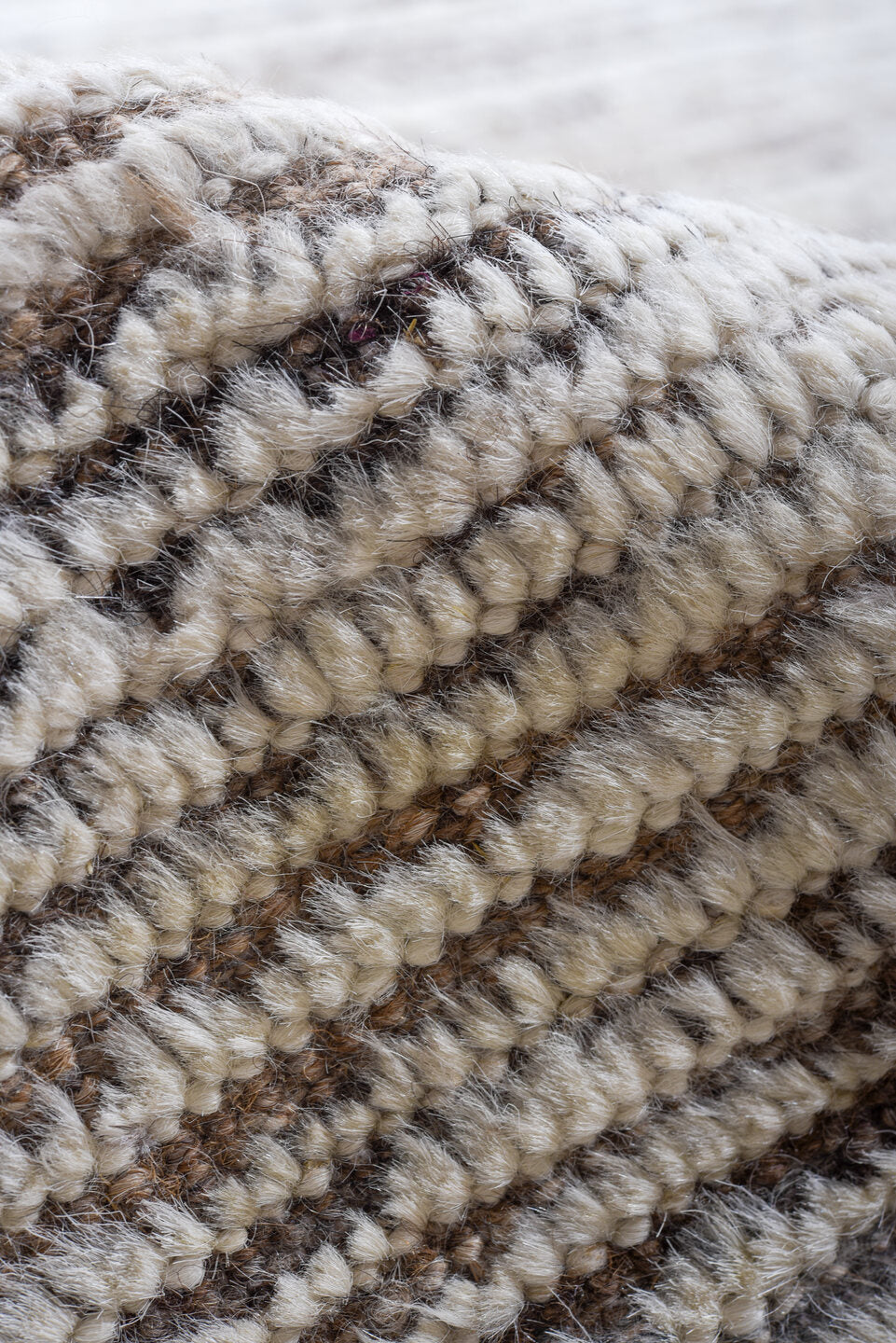 10' x 14' one-of-a-kind handmade vintage Tulu large size rug. Color palette: ivory, taupe, brown, gray, beige