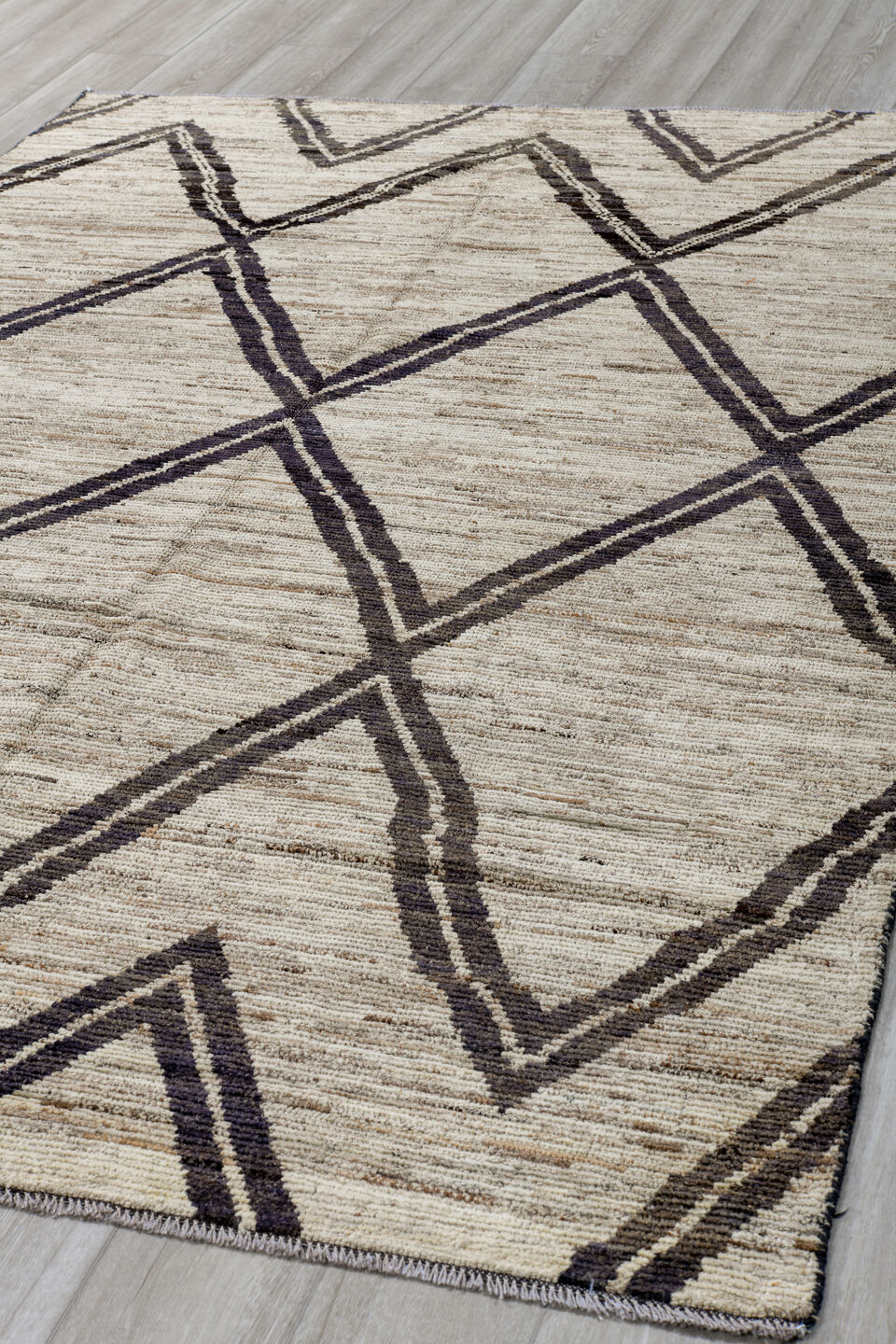 6' x 9' one-of-a-kind handmade vintage Tulu medium size rug. Color palette: ivory, charcoal, taupe, gray, black, beige