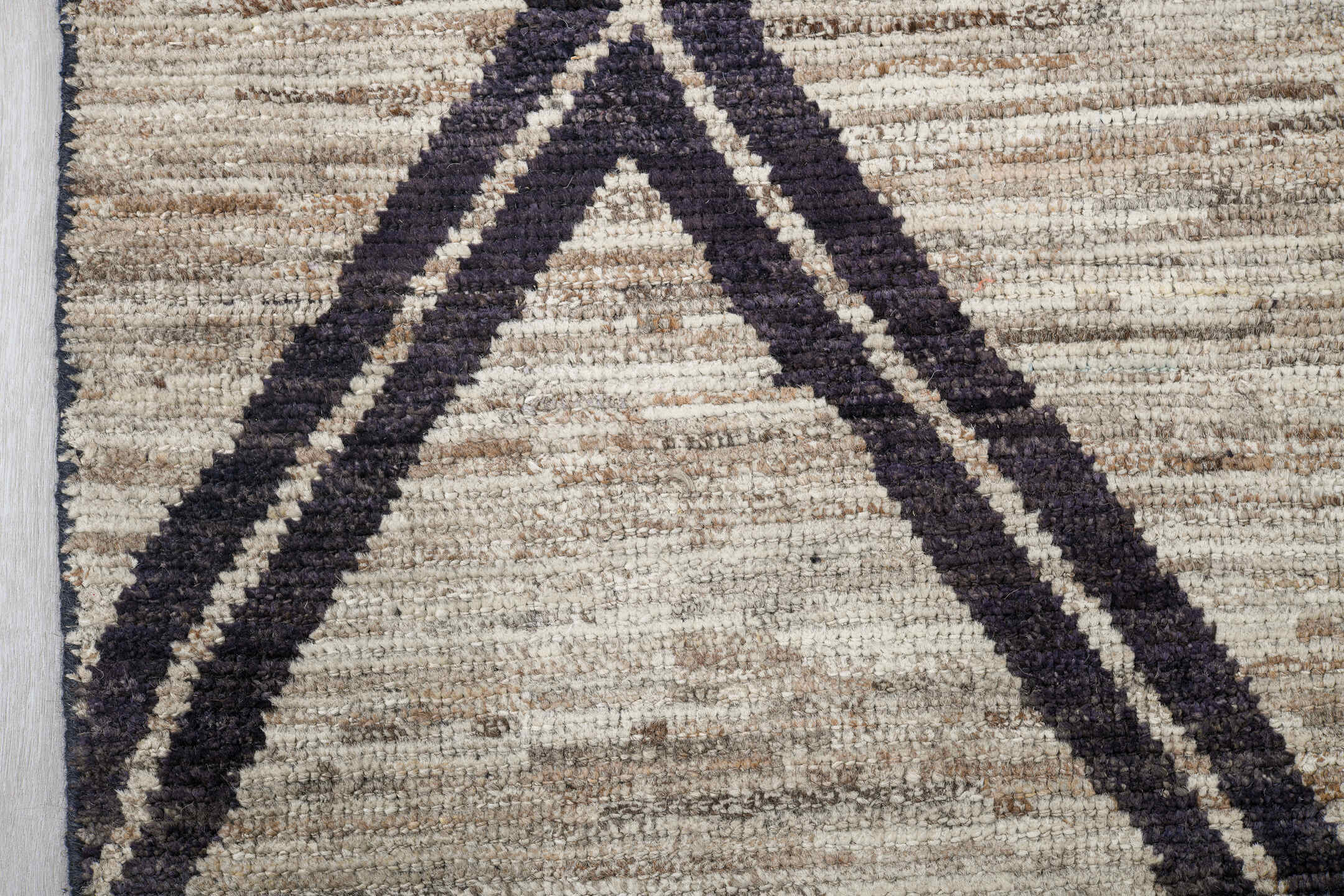 6' x 9' one-of-a-kind handmade vintage Tulu medium size rug. Color palette: ivory, charcoal, taupe, gray, black, beige