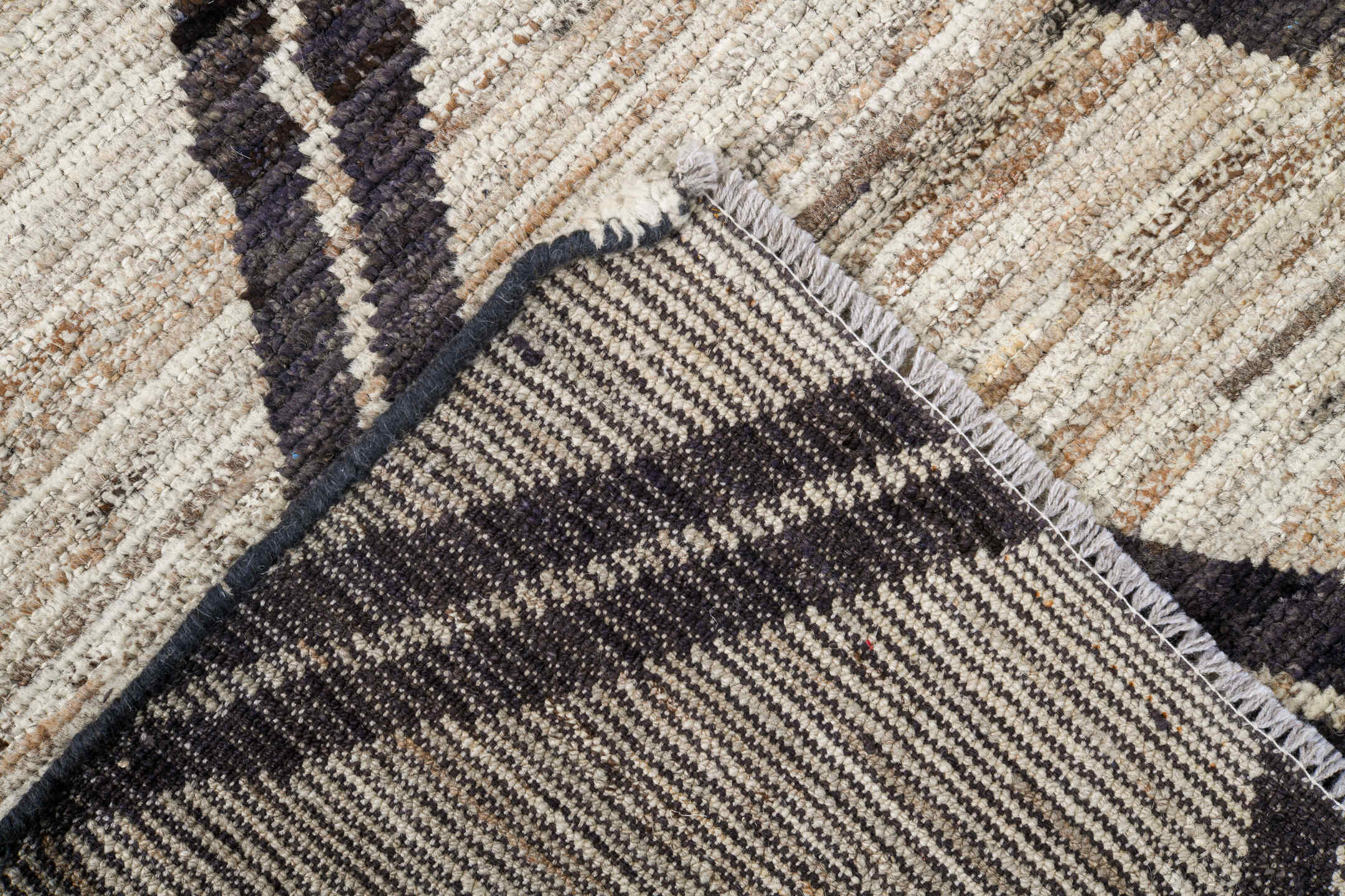 6' x 9' one-of-a-kind handmade vintage Tulu medium size rug. Color palette: ivory, charcoal, taupe, gray, black, beige
