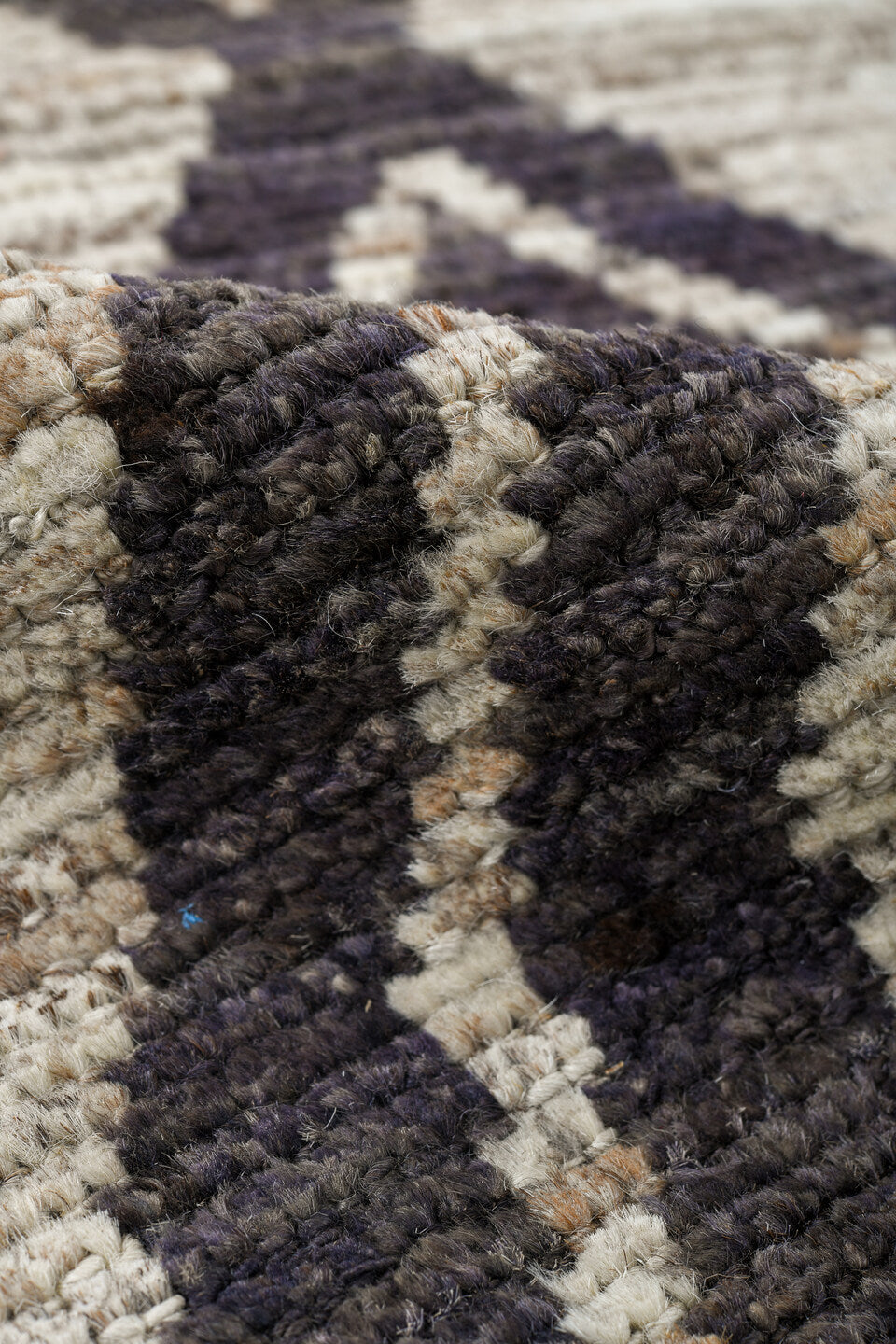 6' x 9' one-of-a-kind handmade vintage Tulu medium size rug. Color palette: ivory, charcoal, taupe, gray, black, beige