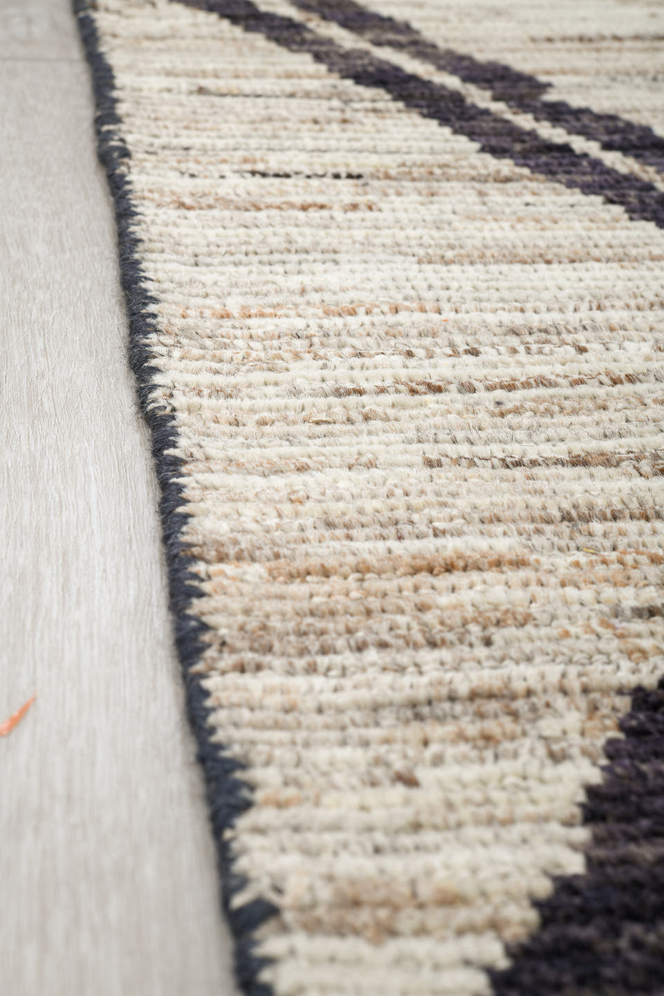 6' x 9' one-of-a-kind handmade vintage Tulu medium size rug. Color palette: ivory, charcoal, taupe, gray, black, beige