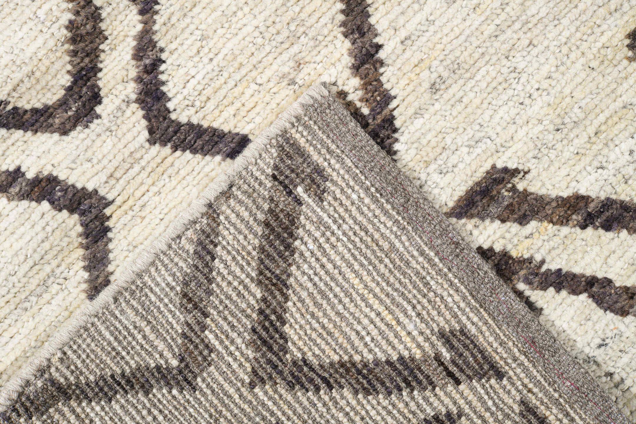 9' x 11' one-of-a-kind handmade vintage Tulu large size rug. Color palette: ivory, charcoal, taupe, cream, gray, black