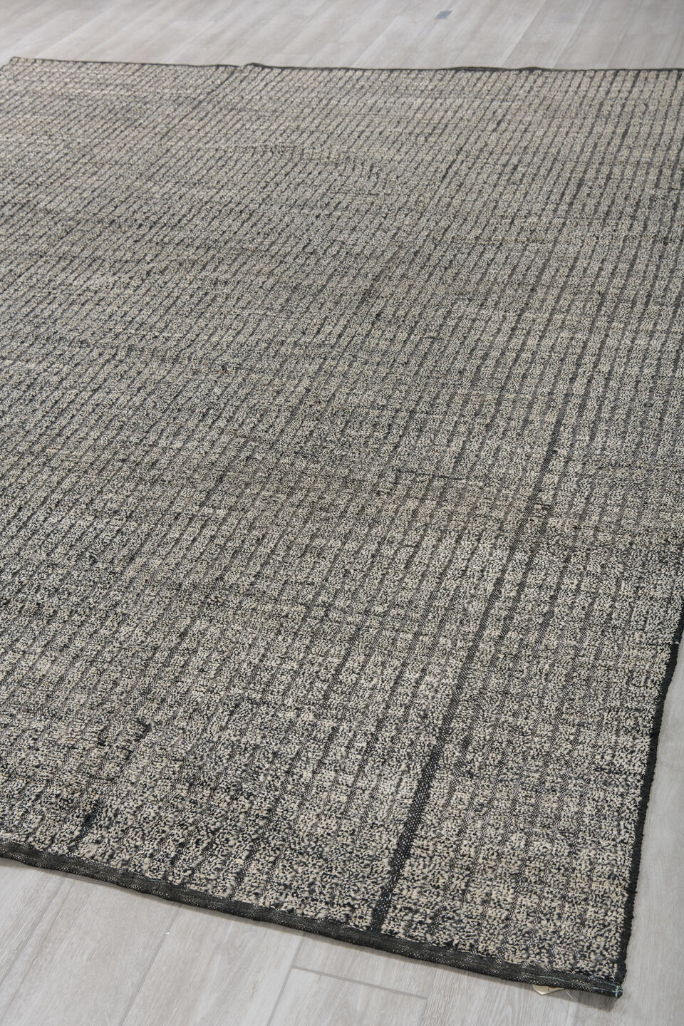9' x 11' one-of-a-kind handmade vintage Tulu large size rug. Color palette: ivory, charcoal, taupe, slate, cream, black