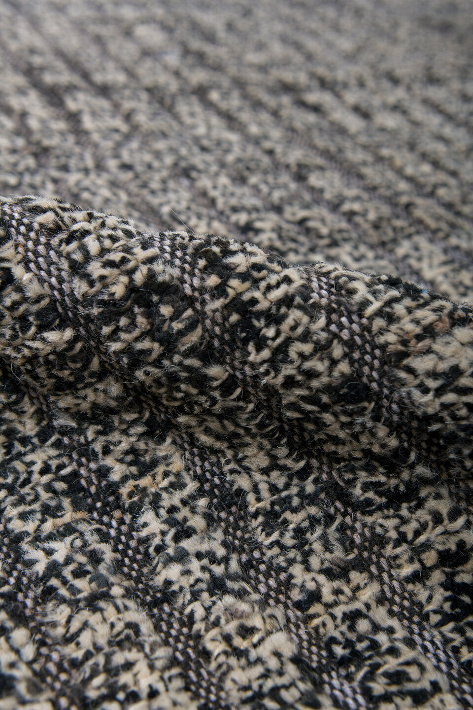 9' x 11' one-of-a-kind handmade vintage Tulu large size rug. Color palette: ivory, charcoal, taupe, slate, cream, black