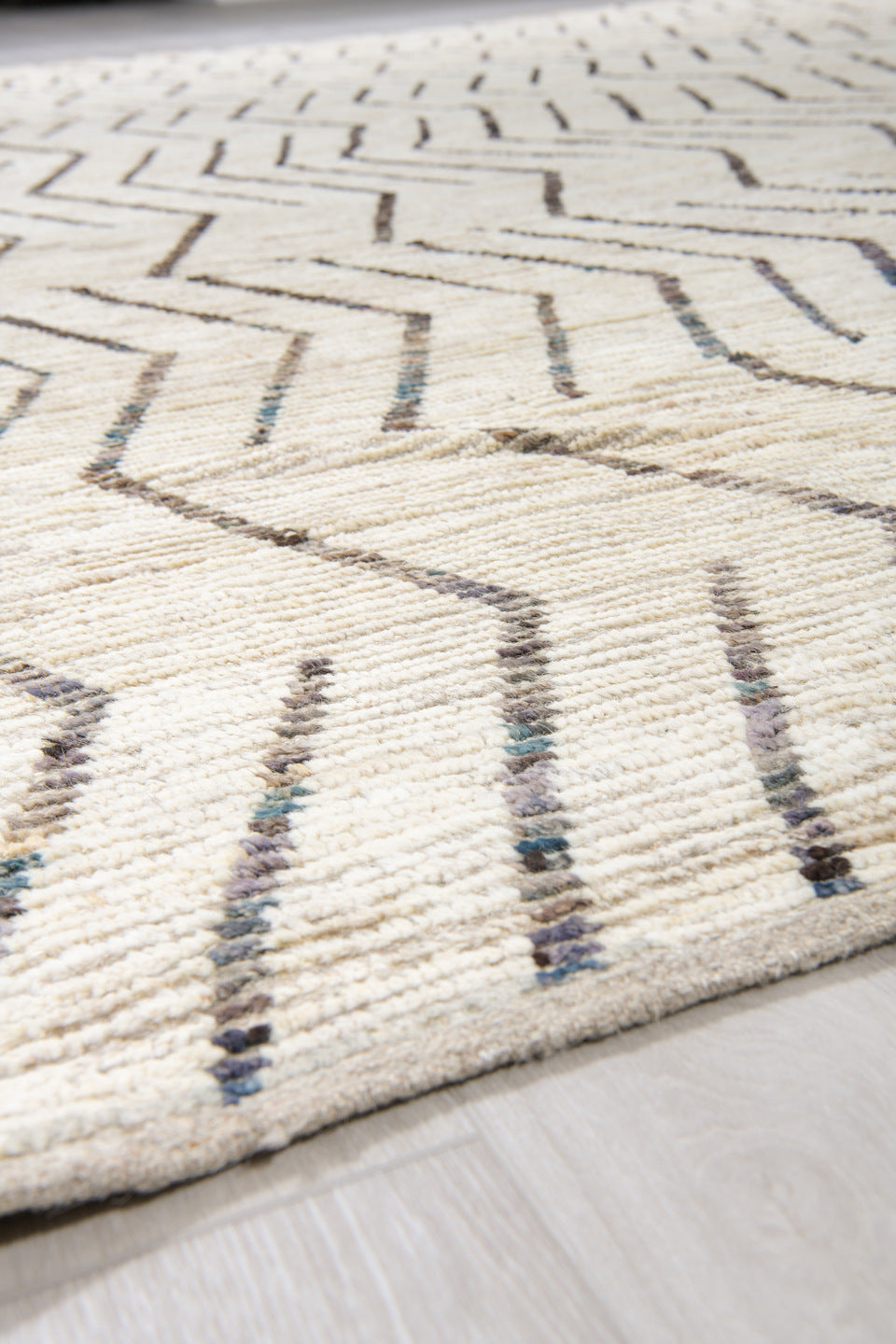 10' x 13' one-of-a-kind handmade vintage Tulu large size rug. Color palette: ivory, charcoal, cream, taupe, black, gray