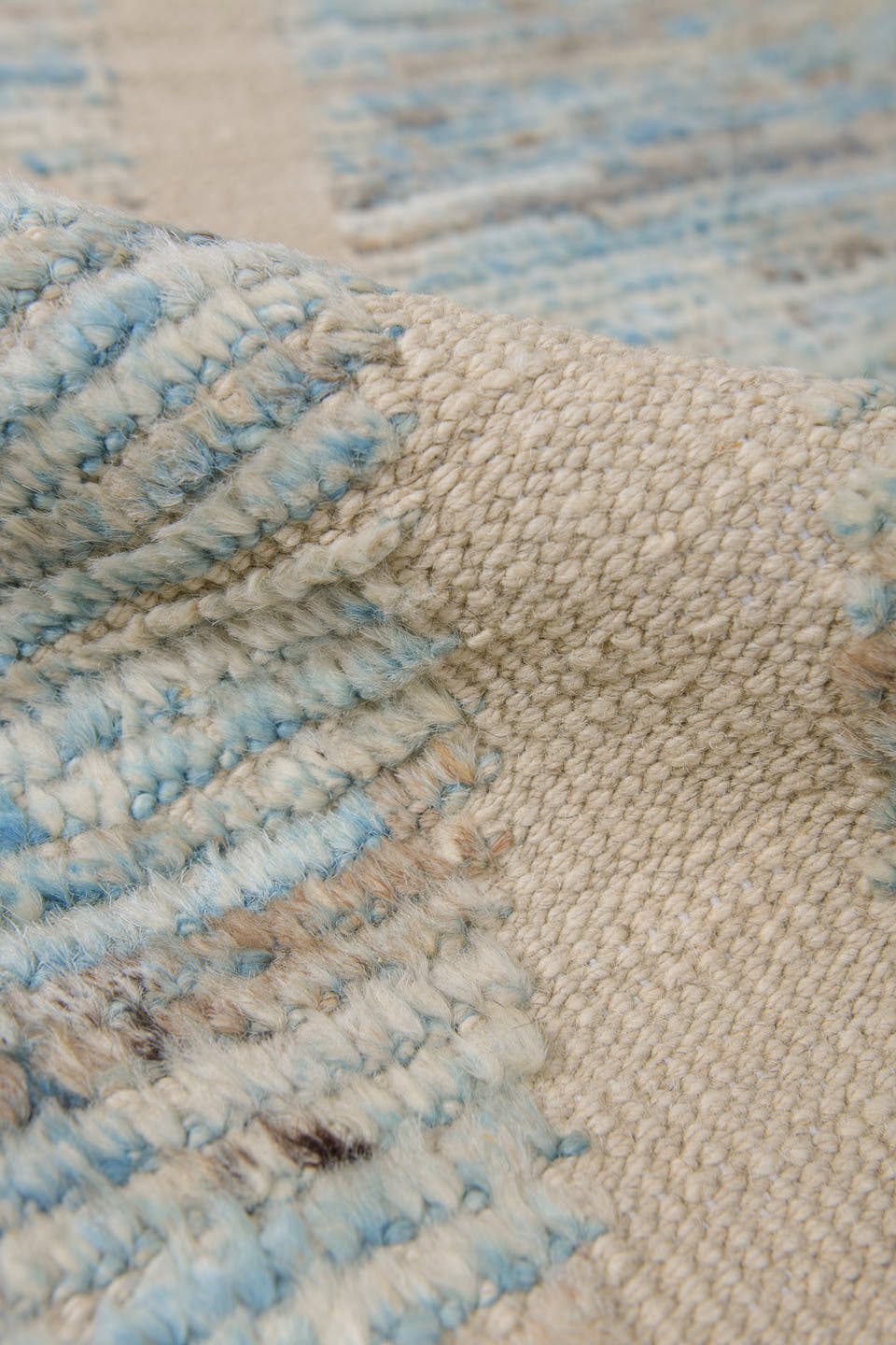 6' x 10' one-of-a-kind handmade vintage Tulu large size rug. Color palette: ivory, pale blue, taupe, gray, cream, light blue