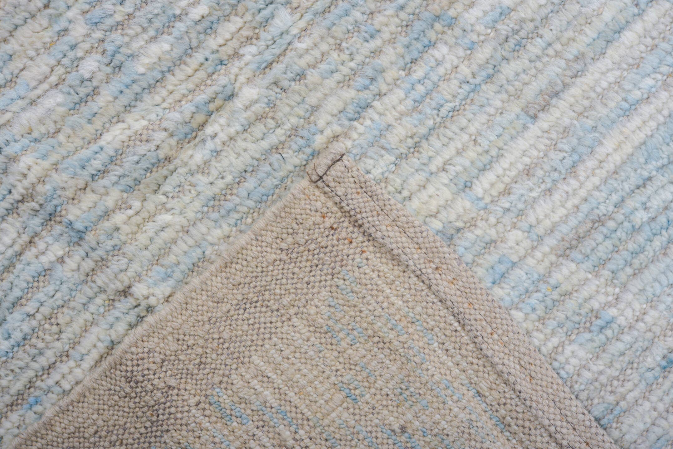 10' x 10' one-of-a-kind handmade vintage Tulu large size rug. Color palette: ivory, pale blue, cream, light gray, light blue