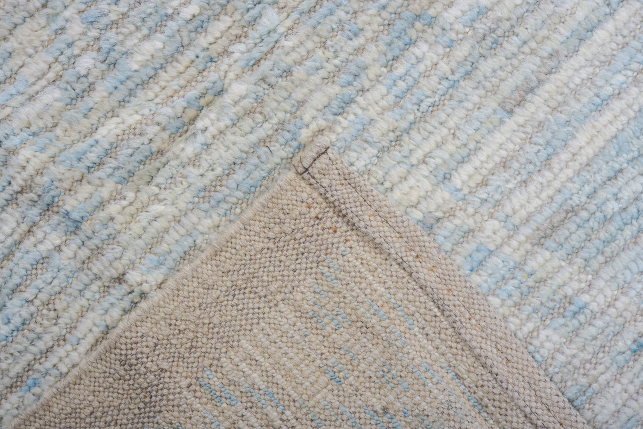 10' x 10' one-of-a-kind handmade vintage Tulu large size rug. Color palette: ivory, pale blue, cream, light gray, light blue