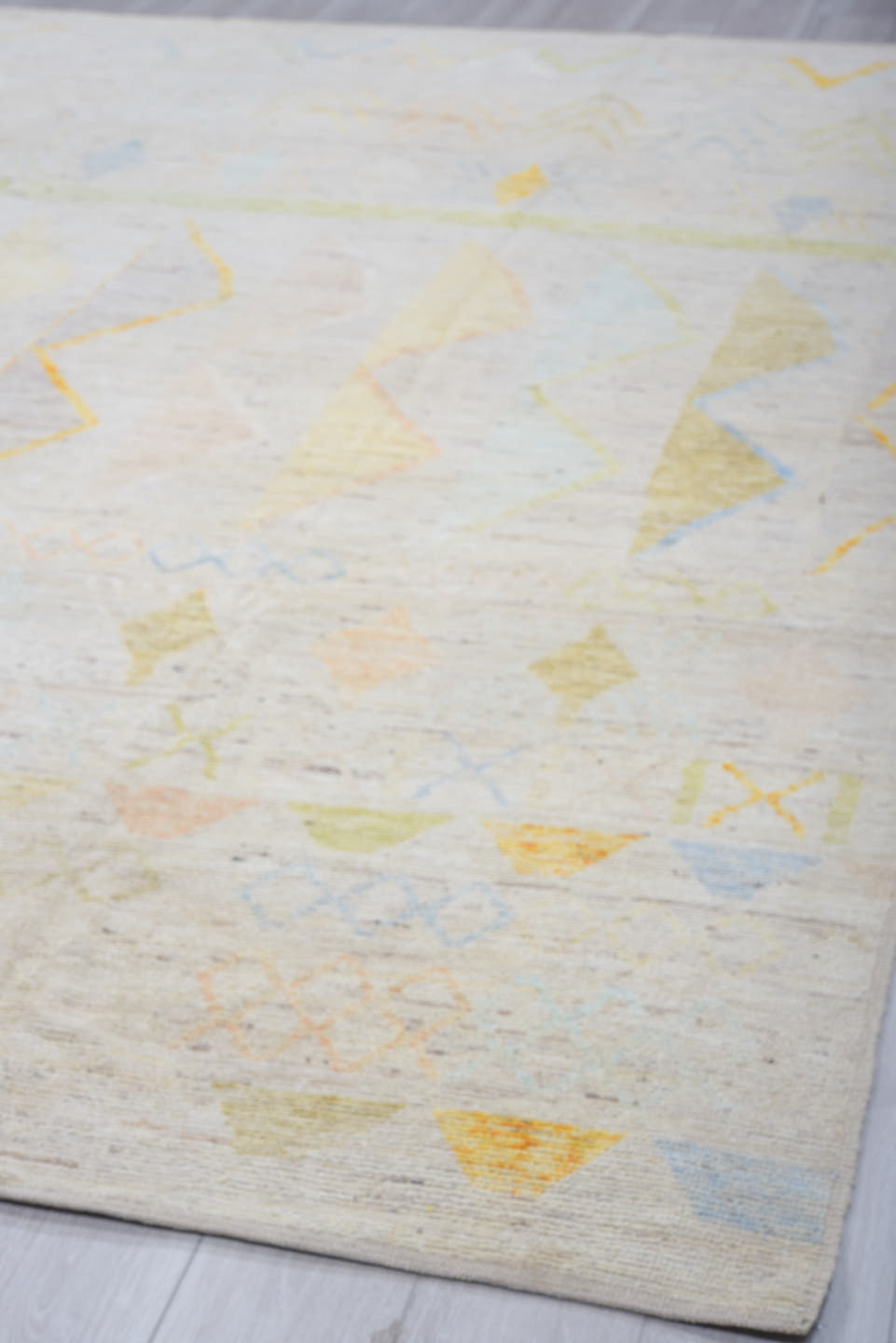 9' x 11' one-of-a-kind handmade vintage Tulu large size rug. Color palette: ivory, pale blue, soft gold, sage, peach, taupe
