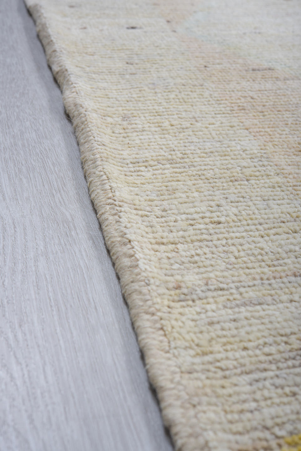 9' x 11' one-of-a-kind handmade vintage Tulu large size rug. Color palette: ivory, pale blue, soft gold, sage, peach, taupe