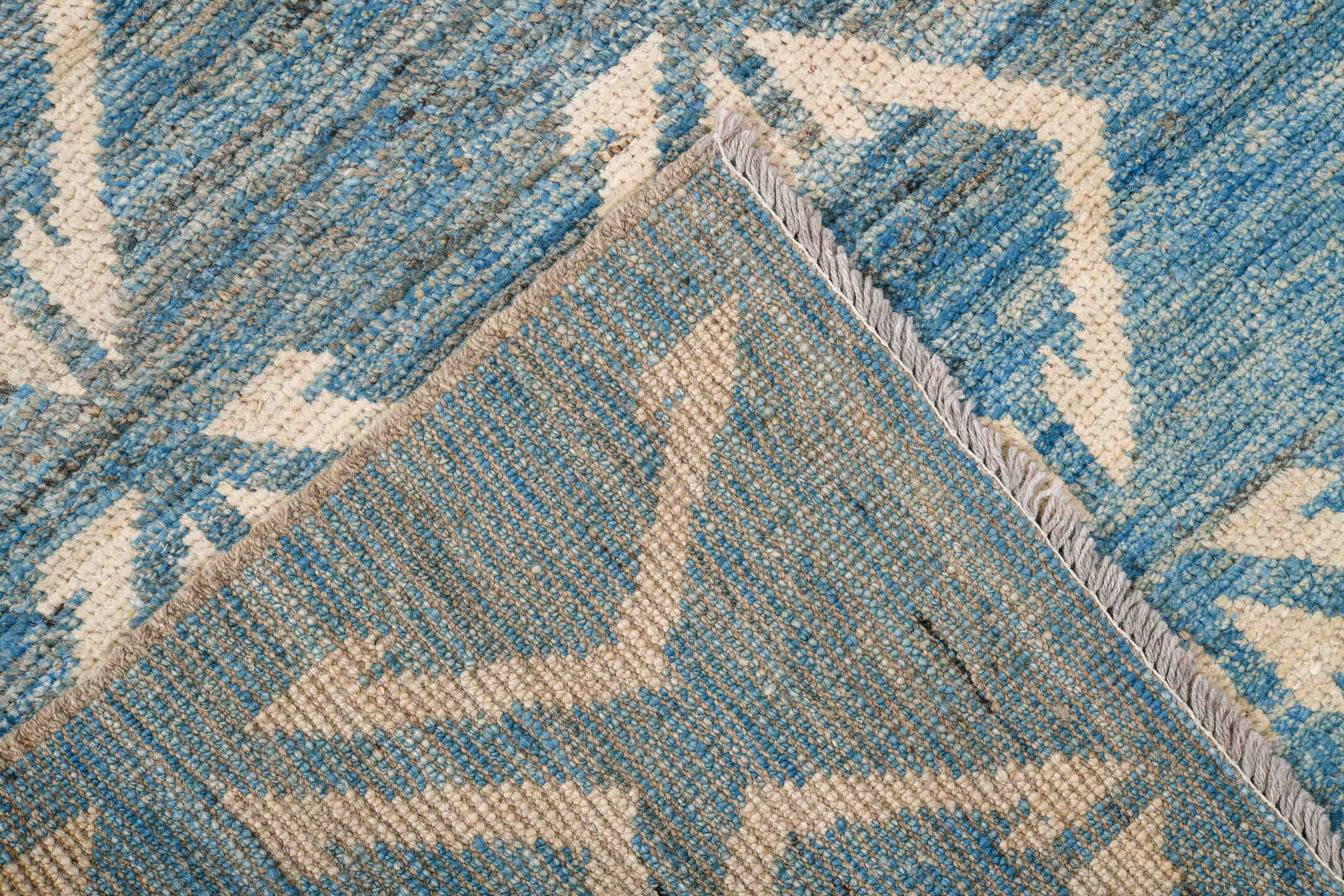 6' x 9' one-of-a-kind handmade vintage Tulu medium size rug. Color palette: sky blue, ivory, slate, cream, light blue, gray
