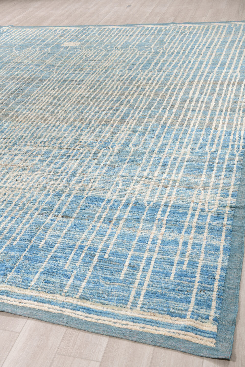 11' x 14' one-of-a-kind handmade vintage Tulu oversize rug. Color palette: blue, ivory, slate, sky blue, gray, light blue