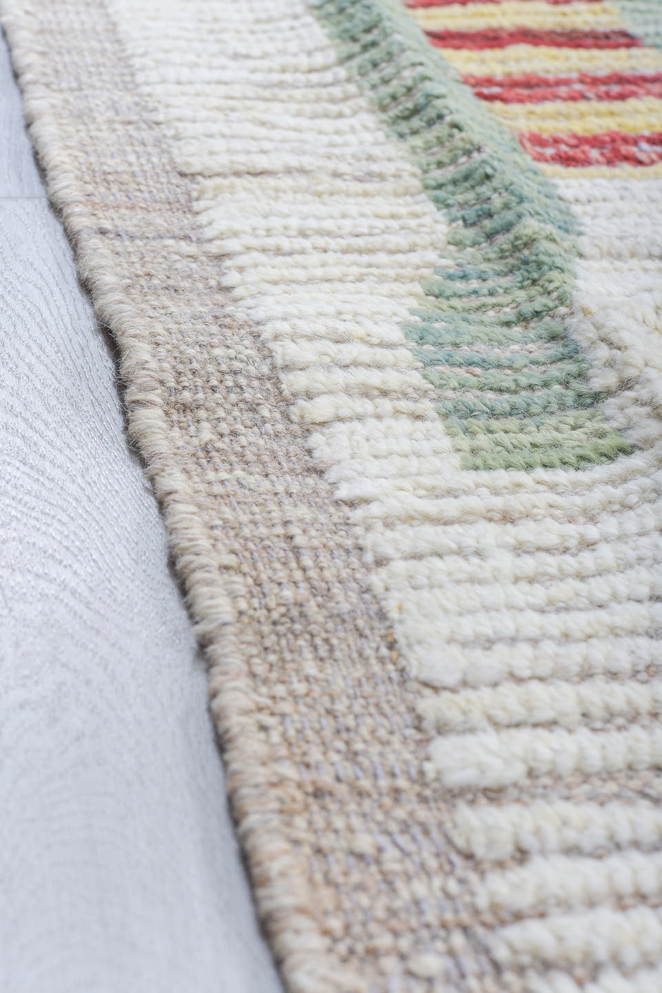10' x 14' one-of-a-kind handmade vintage Tulu oversize rug. Color palette: ivory, rust, sage, charcoal, taupe, terracotta