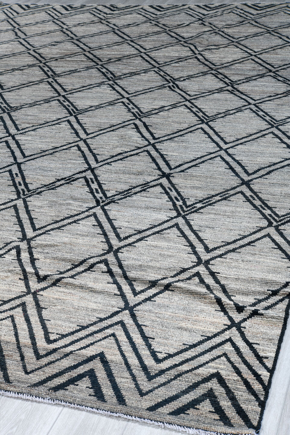 10' x 13' one-of-a-kind handmade vintage Tulu large size rug. Color palette: ivory, charcoal, gray, black