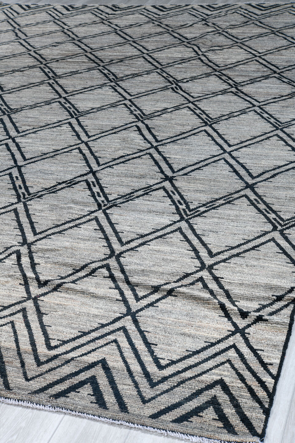 10' x 13' one-of-a-kind handmade vintage Tulu large size rug. Color palette: ivory, charcoal, gray, black