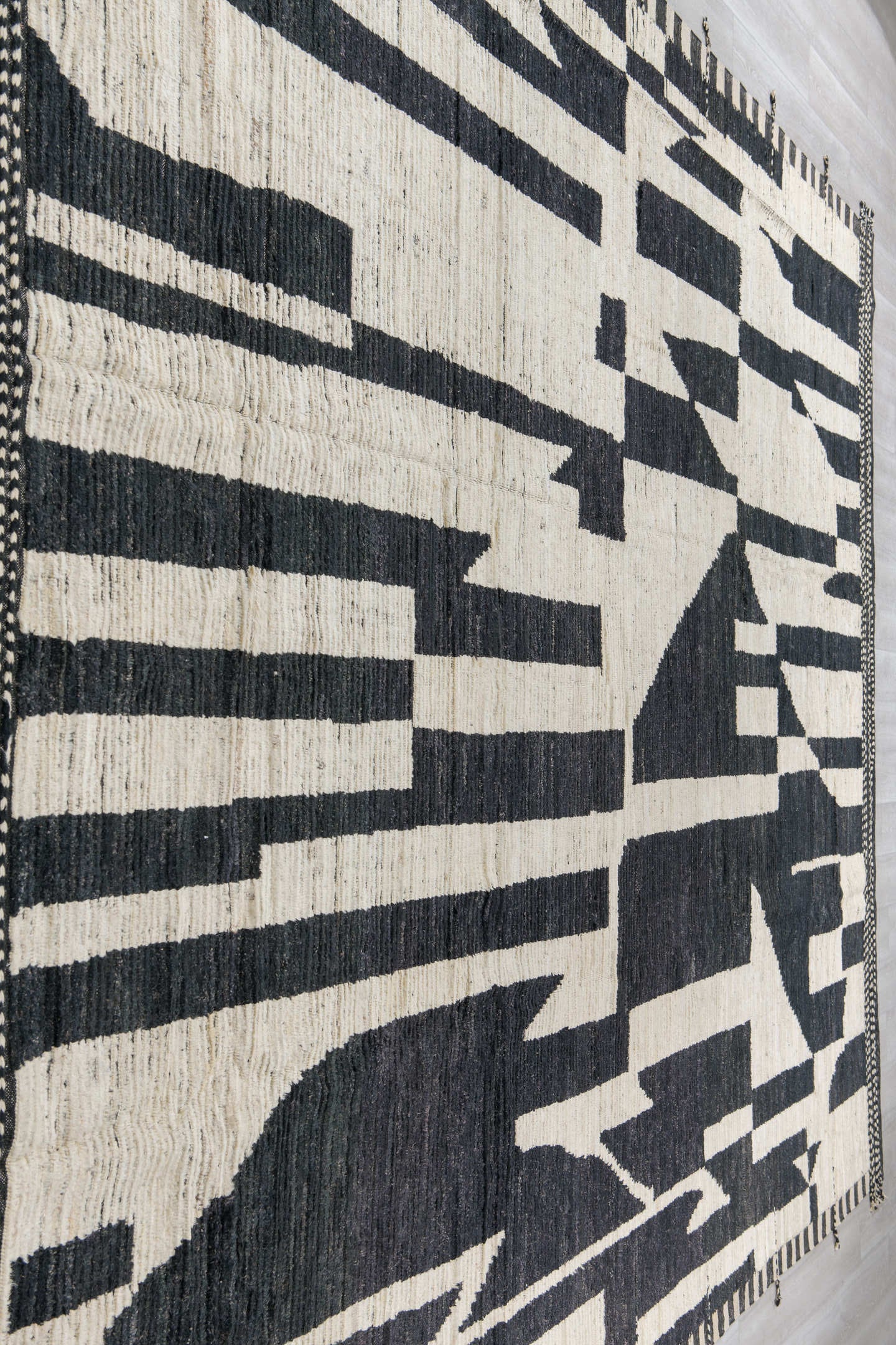 11' x 14' one-of-a-kind handmade vintage Tulu oversize rug. Color palette: ivory, black, charcoal, gray