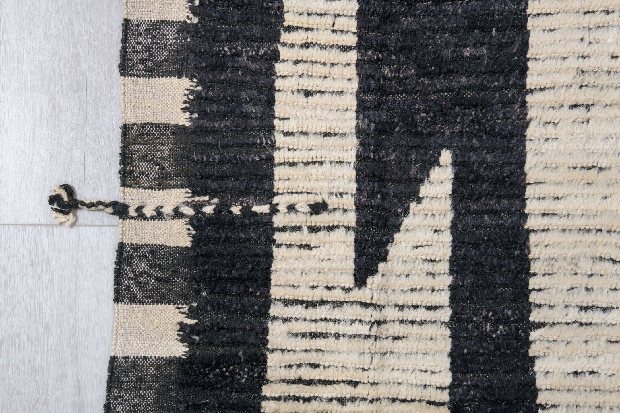 11' x 14' one-of-a-kind handmade vintage Tulu oversize rug. Color palette: ivory, black, charcoal, gray