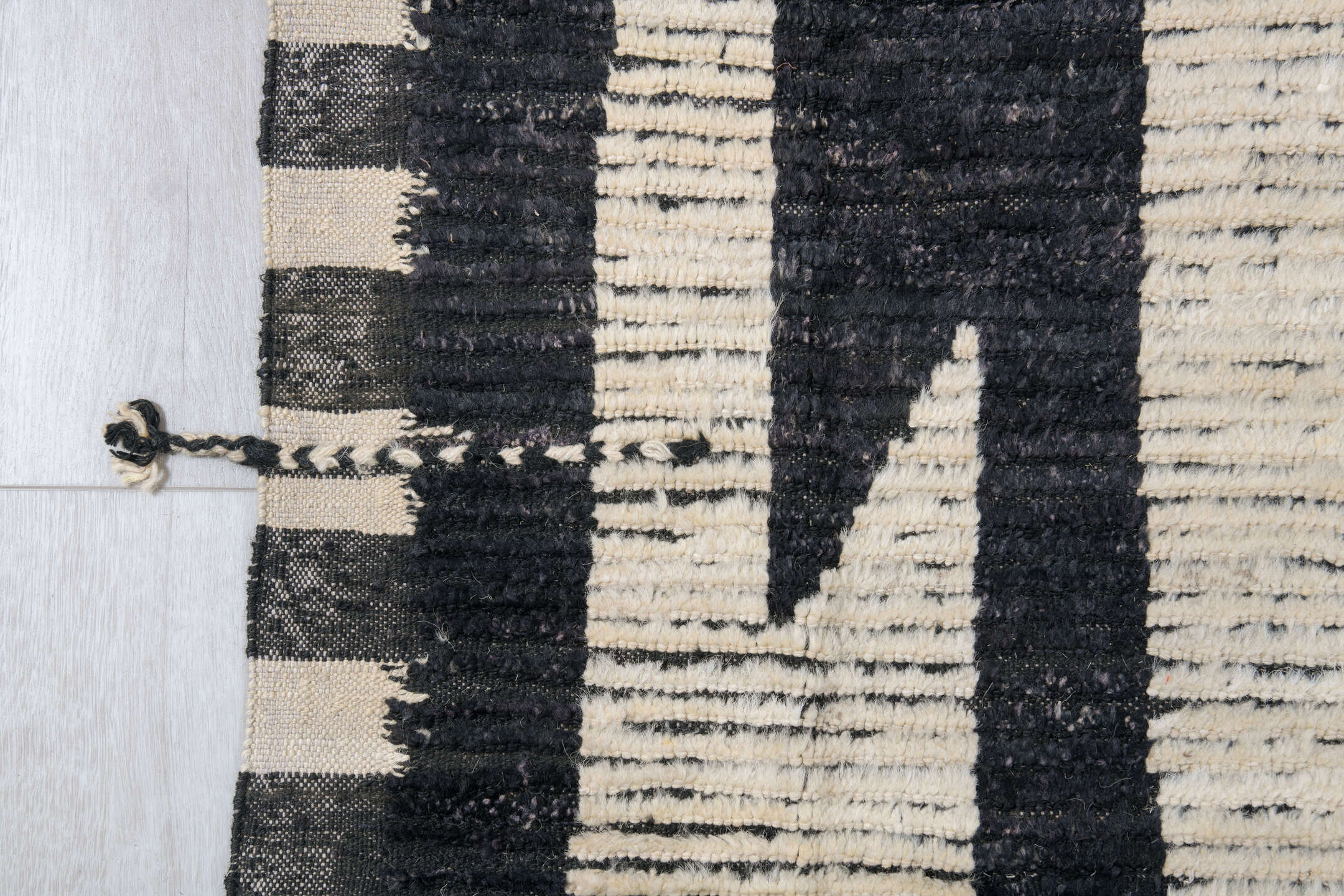 11' x 14' one-of-a-kind handmade vintage Tulu oversize rug. Color palette: ivory, black, charcoal, gray
