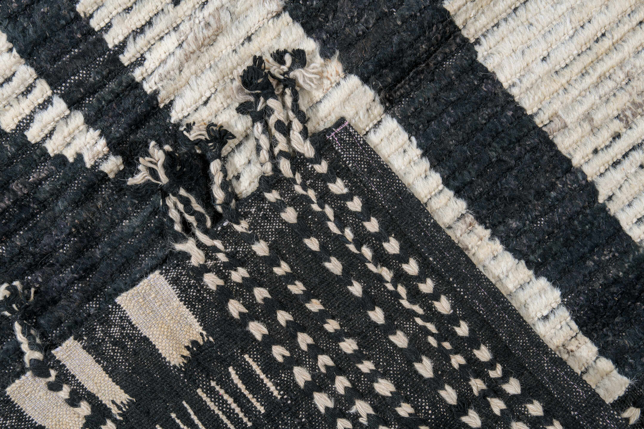 11' x 14' one-of-a-kind handmade vintage Tulu oversize rug. Color palette: ivory, black, charcoal, gray