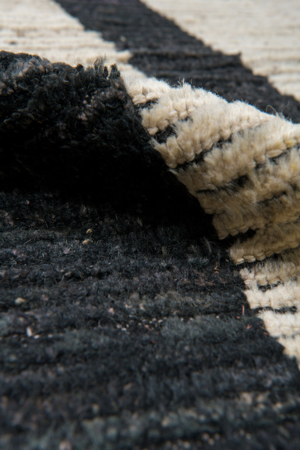 11' x 14' one-of-a-kind handmade vintage Tulu oversize rug. Color palette: ivory, black, charcoal, gray