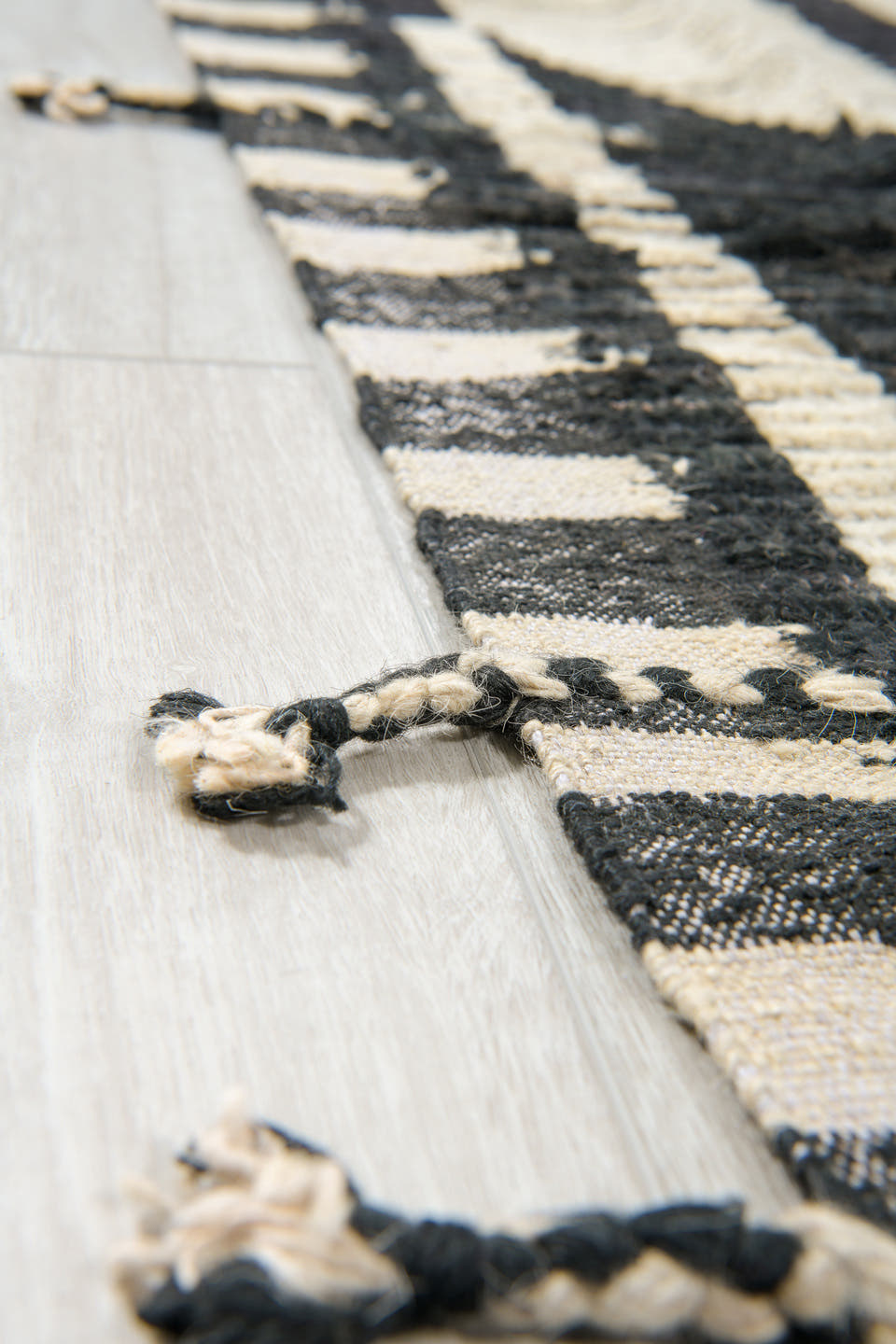 11' x 14' one-of-a-kind handmade vintage Tulu oversize rug. Color palette: ivory, black, charcoal, gray