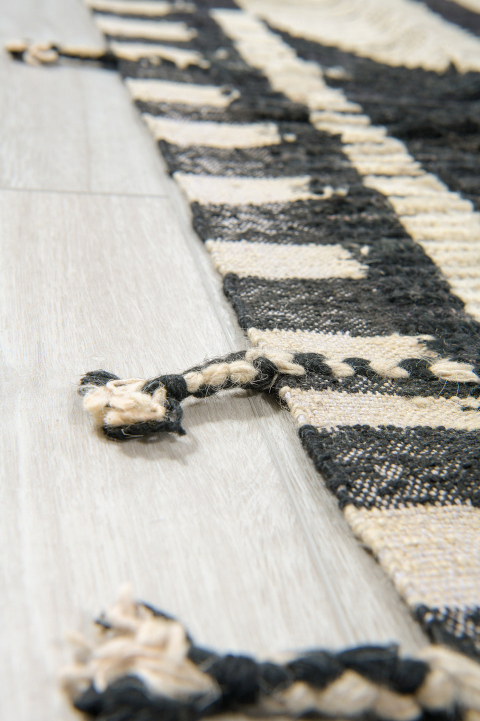 11' x 14' one-of-a-kind handmade vintage Tulu oversize rug. Color palette: ivory, black, charcoal, gray