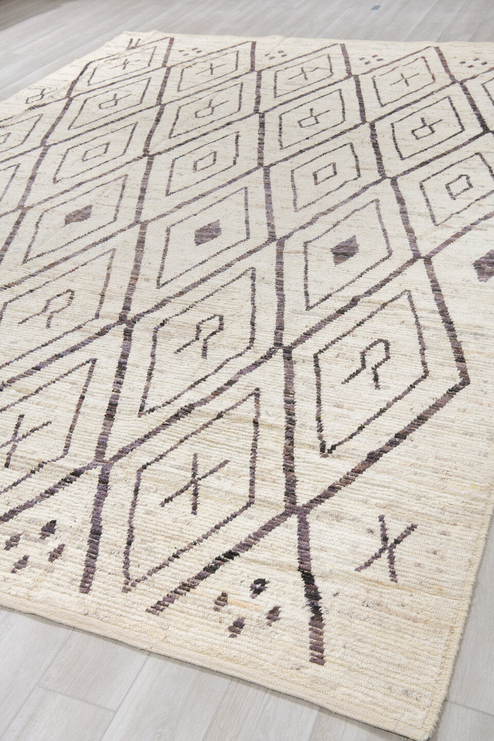 10' x 14' one-of-a-kind handmade vintage Tulu large size rug. Color palette: ivory, cream, charcoal, taupe, brown, black