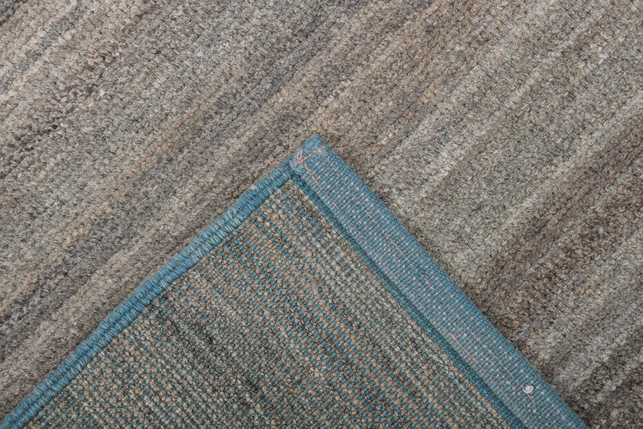 6' x 9' one-of-a-kind handmade vintage Tulu medium size rug. Color palette: taupe, ivory, charcoal, camel, sky_blue, beige